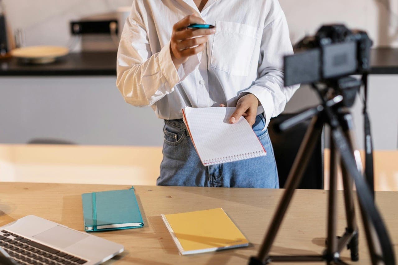 Productivity tools, study materials, and digital creator resources in a single flat-lay